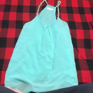Light teal razorback tank tops
